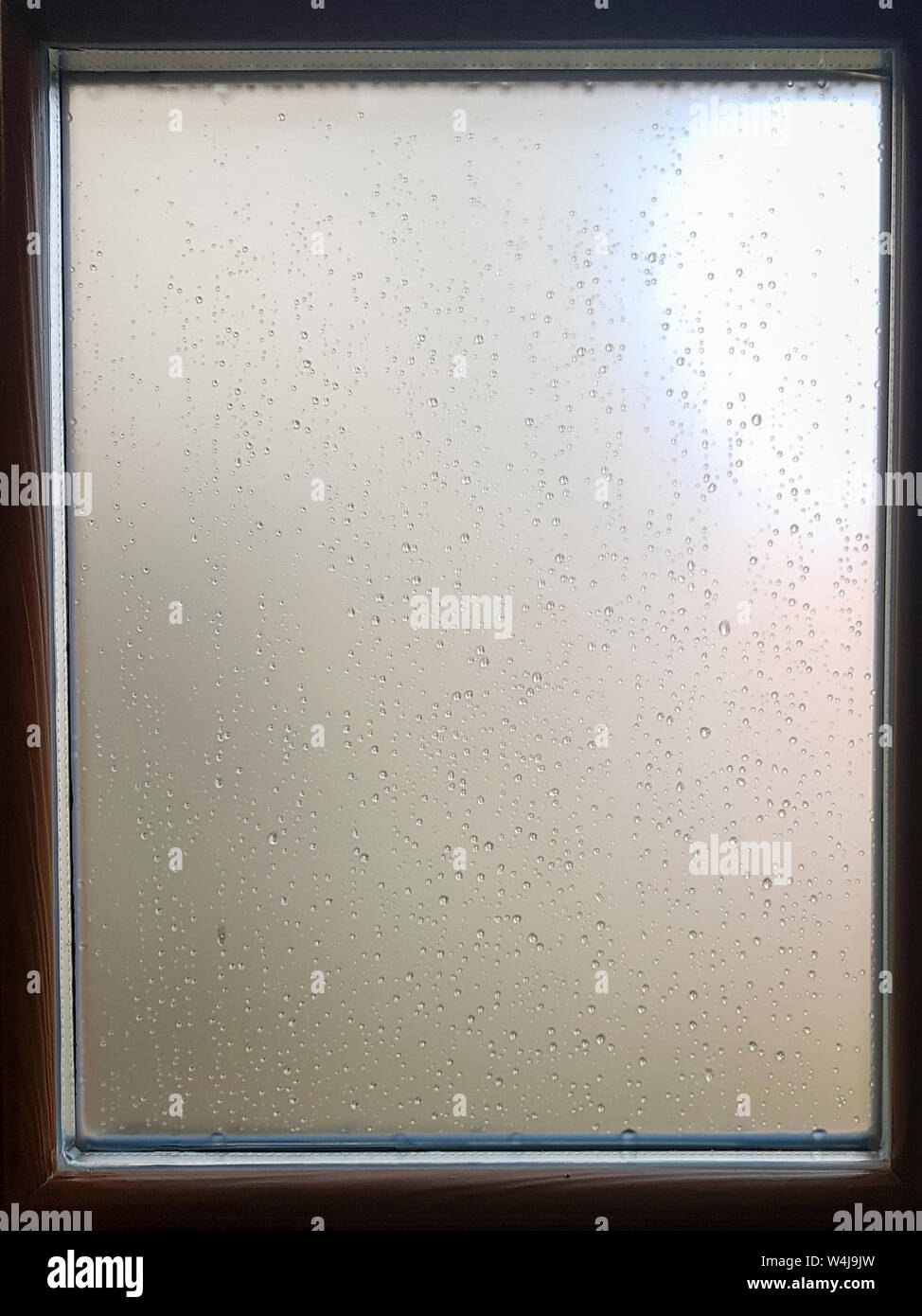 Raindrops on a blured window Stock Photo