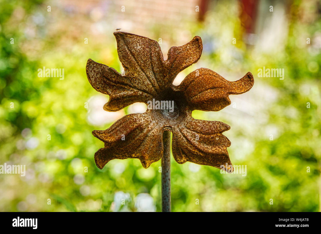 Metal petals, a piece of metal garden art. Upper Wield, Alresford, Hampshire, UK Stock Photo