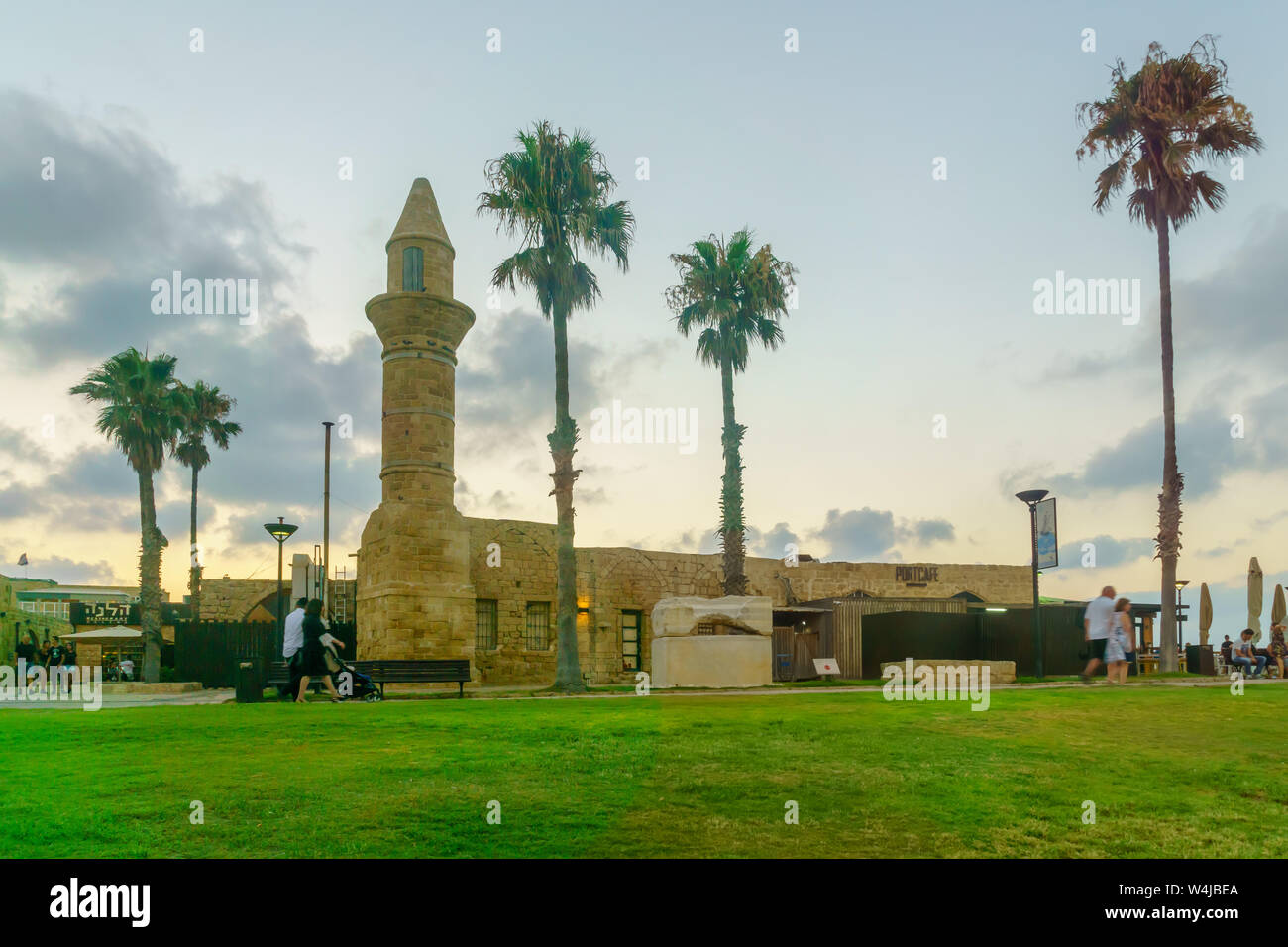 Caesarea, Israel - July 22, 2019: Sunset view of the Bosnian mosque, with visitors, in Caesarea National Park, Northern Israel Stock Photo