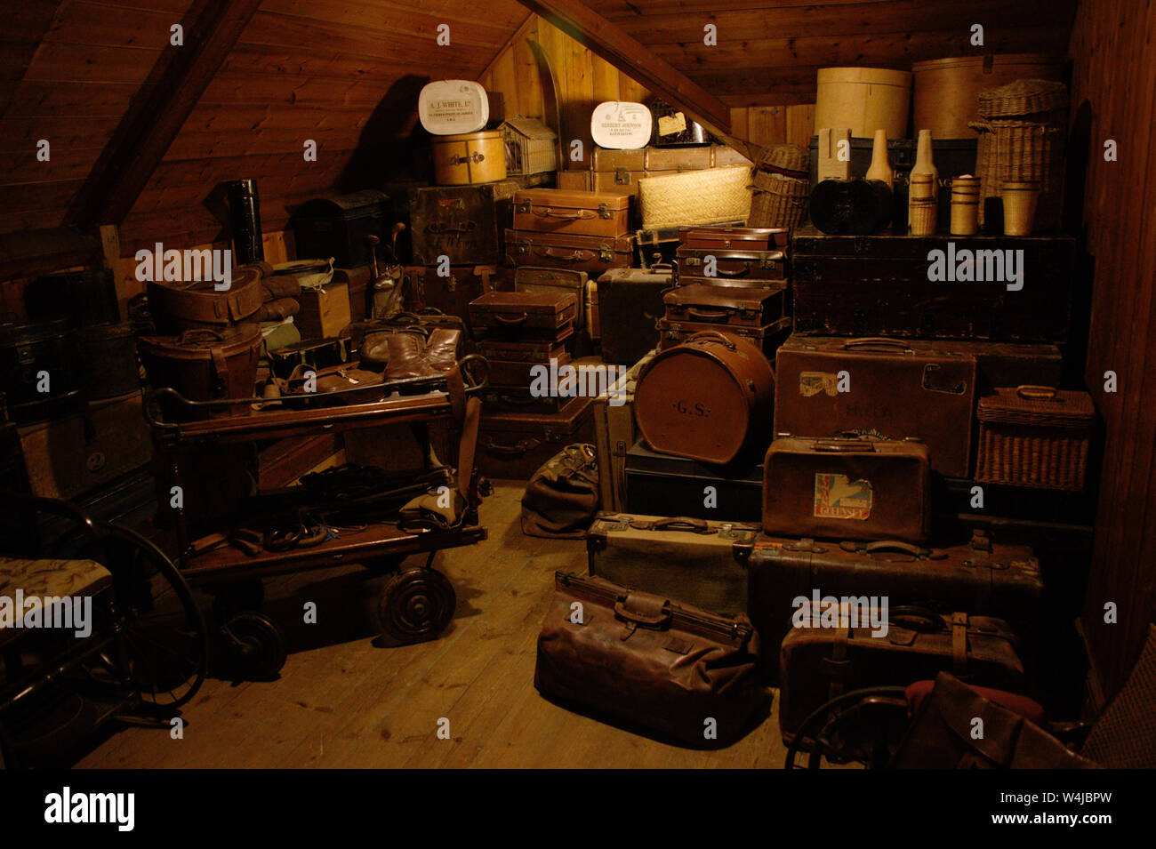 Storage room for antique suitcases. Attic. Stock Photo