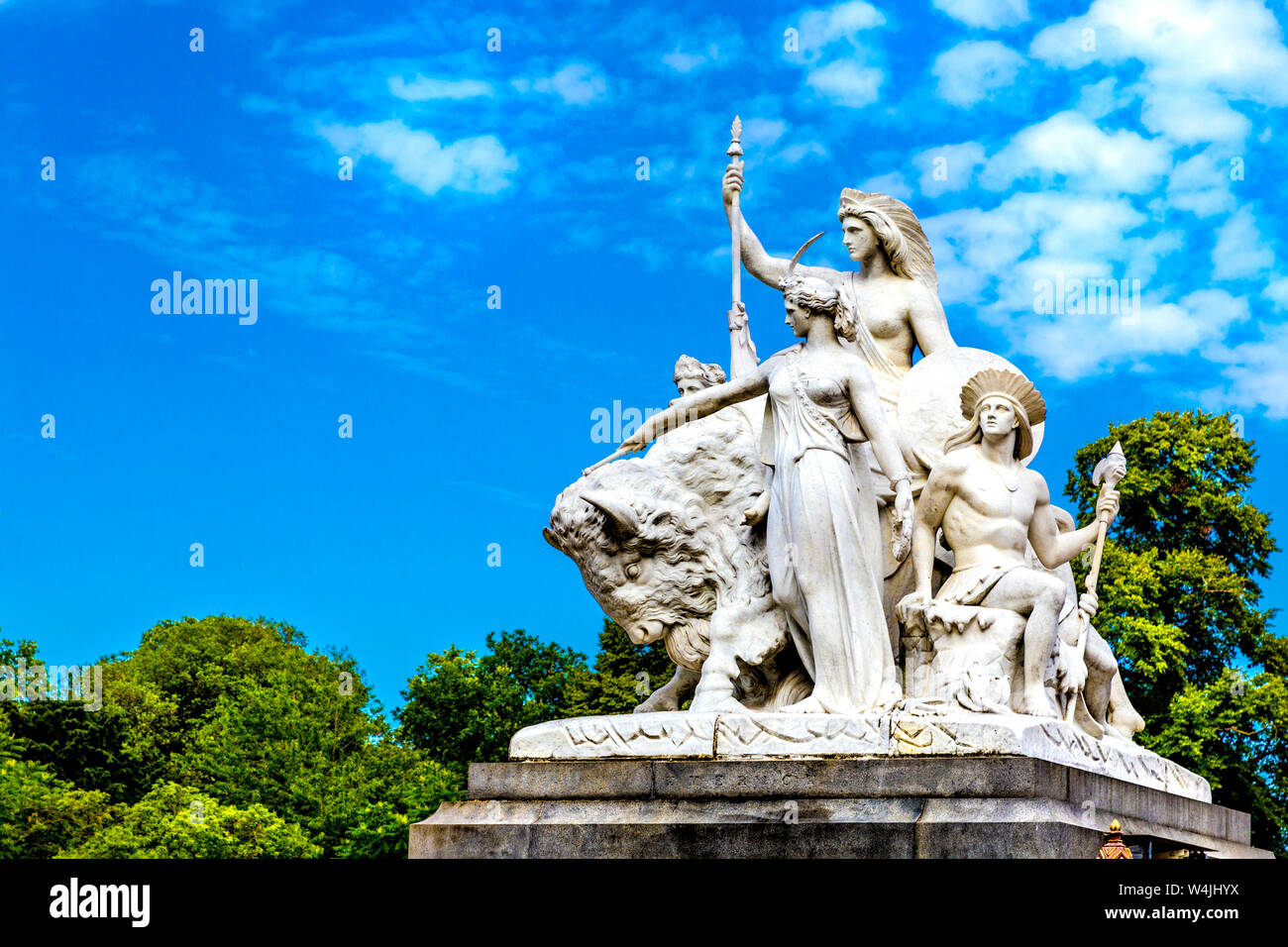 One of the allegorical sculptures representing America by John Bell on the outer corner of the Albert Memorial, London, UK Stock Photo