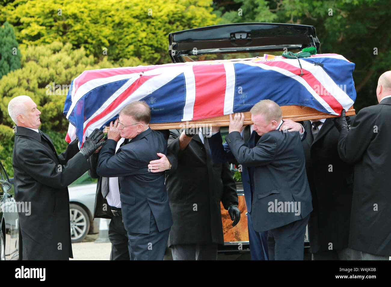 Joe Frazer (front left) helps carry the coffin of his brother Willie for the funeral service at Five Mile Hill Full Gospel Fellowship Church on the Maytown Road, County Armagh, Monday July 1st, 2019. (Photo by Paul McErlane for the Belfast Telegraph) Stock Photo