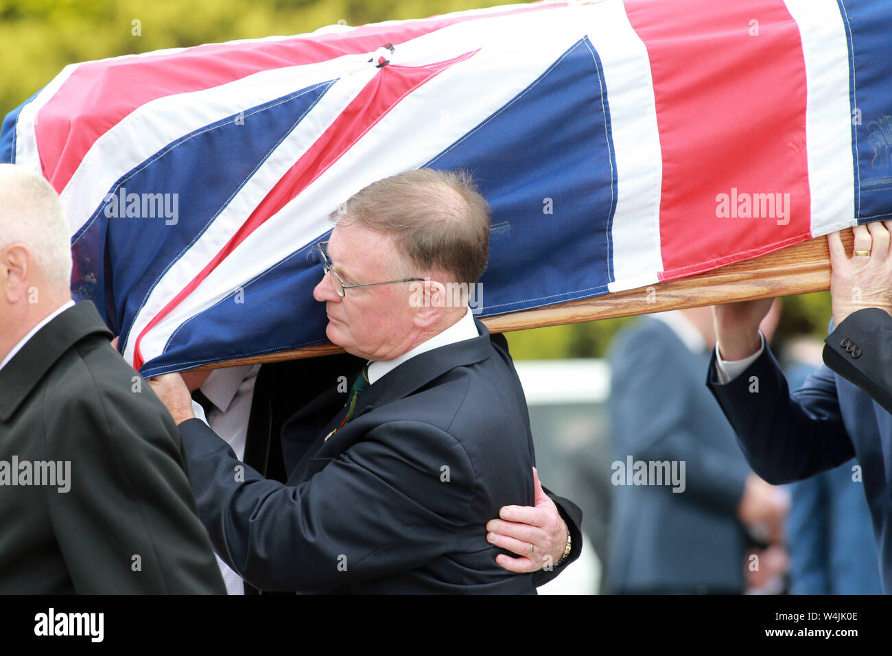 Joe Frazer (front) helps carry the coffin of his brother Willie Frazer for the funeral service at Five Mile Hill Full Gospel Fellowship Church on the Maytown Road, County Armagh, Monday July 1st, 2019. (Photo by Paul McErlane for the Belfast Telegraph) Stock Photo
