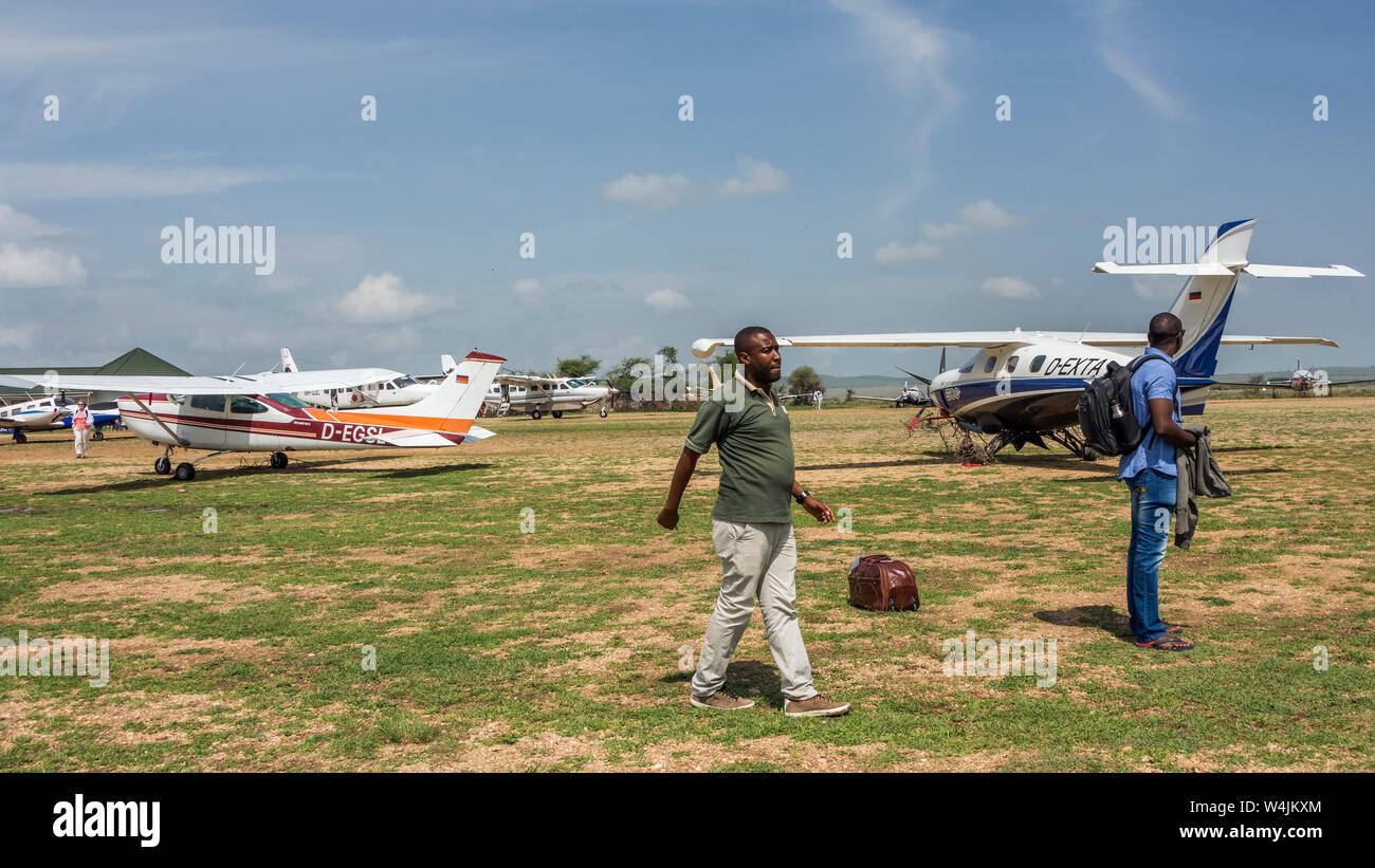 Safari planes gathering at Seronera airstrip, Serengeti, Tanzania Stock Photo