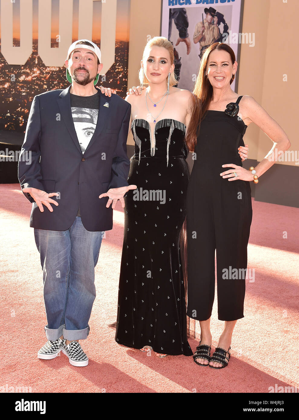 HOLLYWOOD, CA - JULY 22: (L-R) Kevin Smith, Harley Quinn Smith and Jennifer Schwalbach Smith attend the Sony Pictures' 'Once Upon A Time...In Hollywood' Los Angeles Premiere at the TCL Chinese Theatre on July 22, 2019 in Hollywood, California. Stock Photo