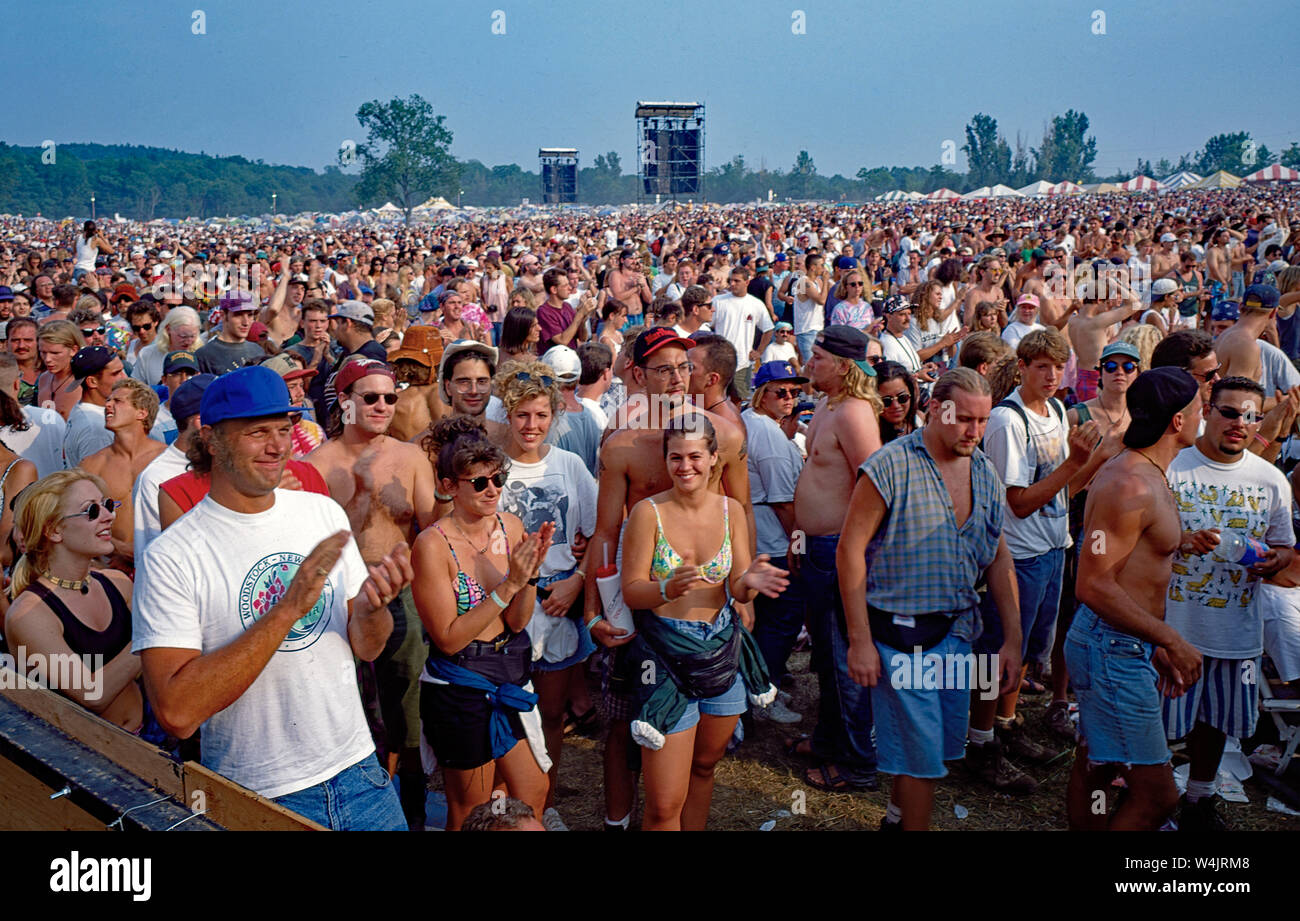 Saugerties, New York, USA, August, 1994 Massive crowds fill the muddy  fields at the Winston Farm during Woodstock 94 a music festival to  commemorate the 25th anniversary of the original Woodstock festival