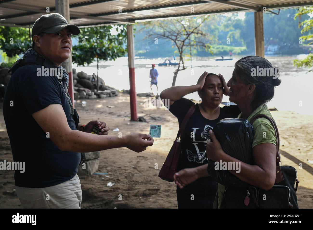 Ciudad Hidalgo, Chiapas, Mexico. 23rd July, 2019. Guatemalan women get upset after a Mexican immigration official said they lacked proper documentation to cross into Mexico to do some shopping. As a 45-day deadline imposed by President Trump for Mexico to show progress in slowing migrants crossing to the U.S passed Monday, the administration of Mexican President Lopez-Obrador declared that Mexico has contributed to a 36.2 percent drop in migrant arrests at the US border. Credit: Miguel Juarez Lugo/ZUMA Wire/Alamy Live News Stock Photo