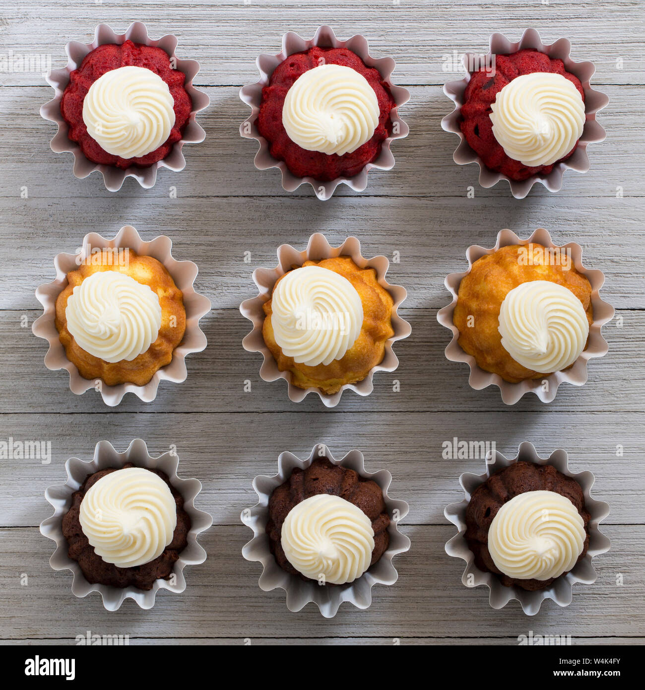Mini Bundt Cakes With Cream Cheese Icing Stock Photo 261034815