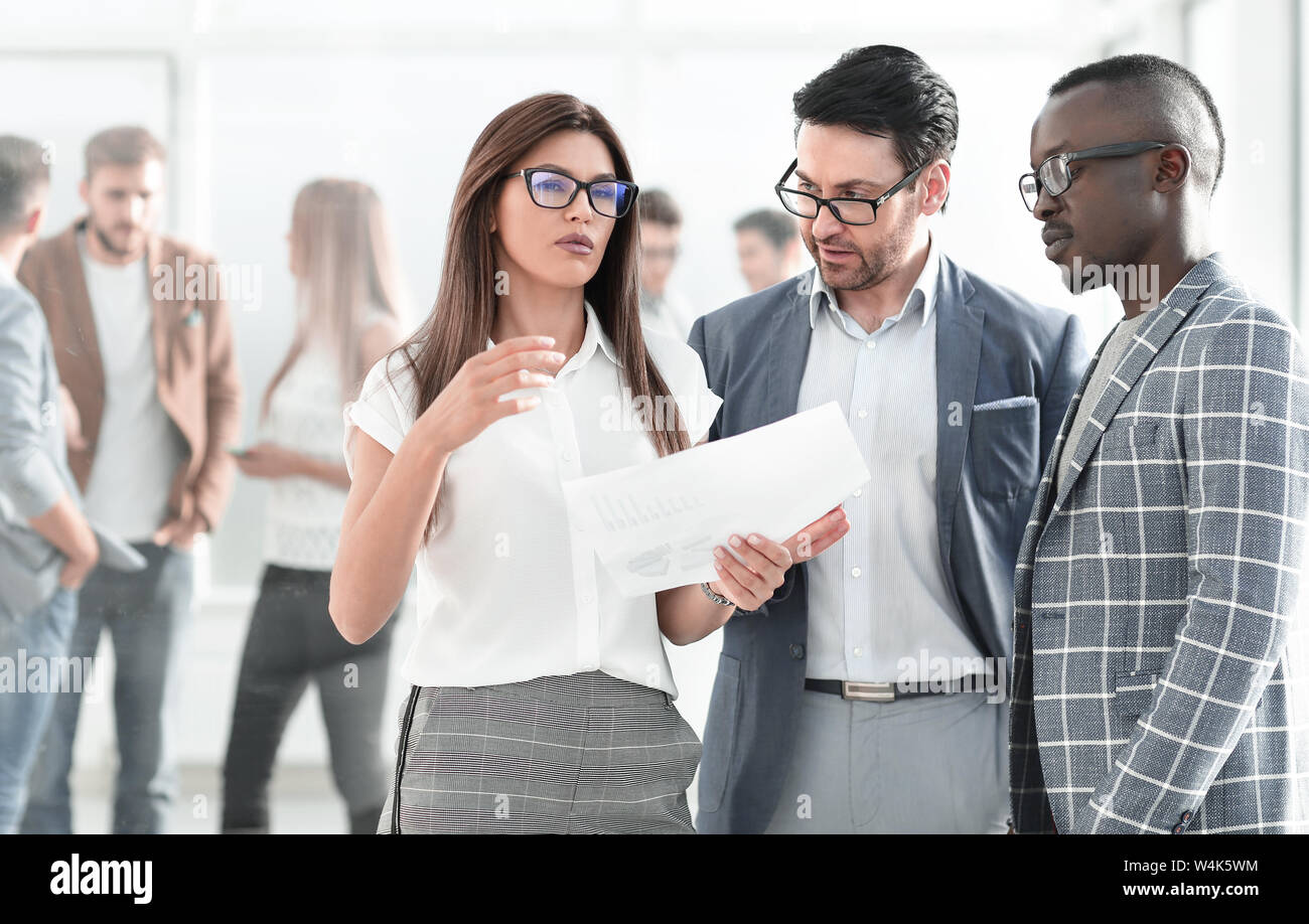 group of business people discussing a business document Stock Photo