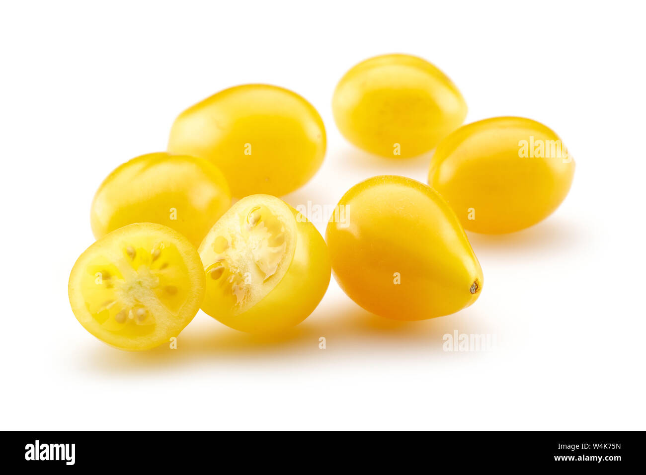 Yellow cherry tomatoes isolated on white background Stock Photo
