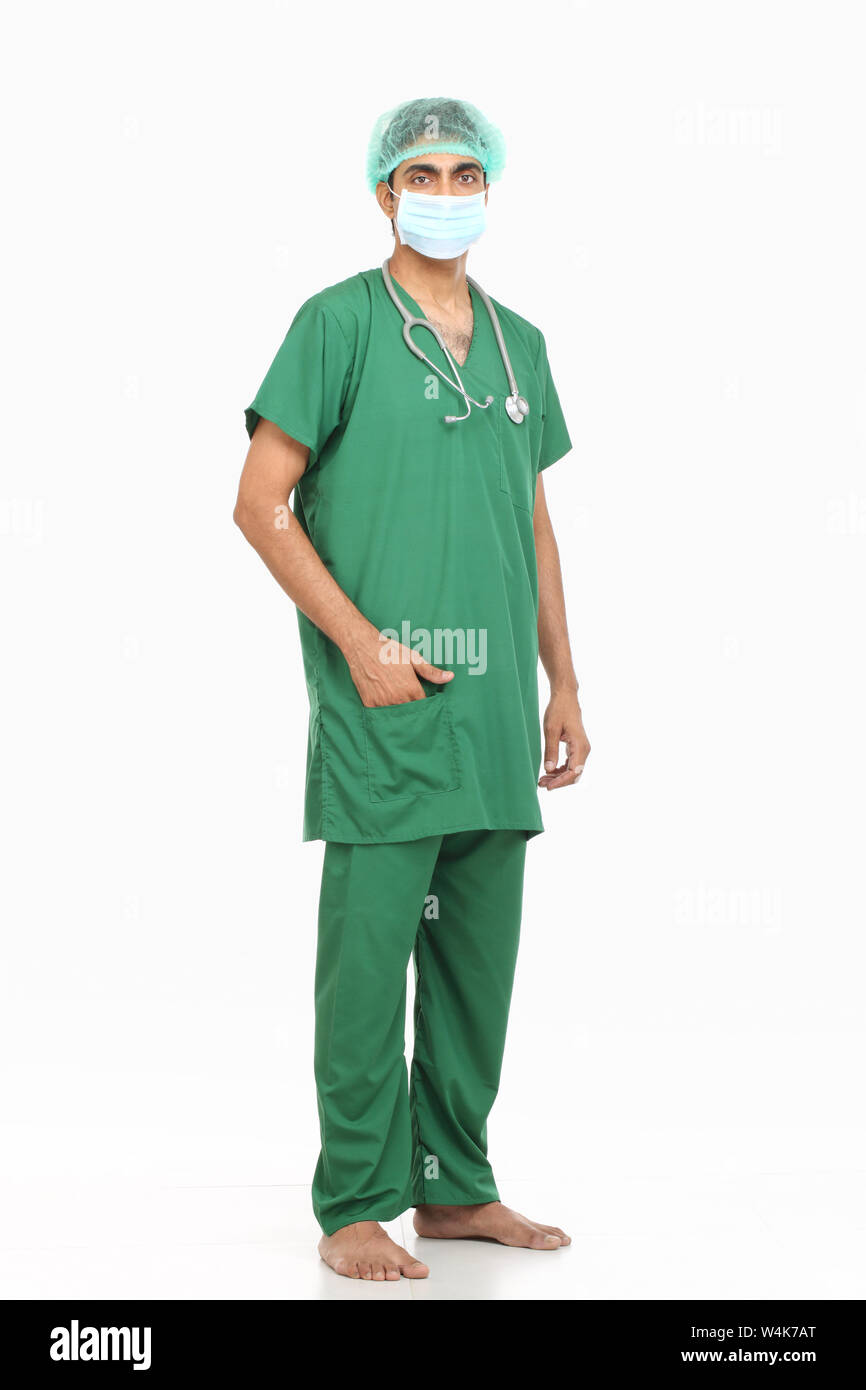 Indian surgeon standing with his hands in pockets Stock Photo