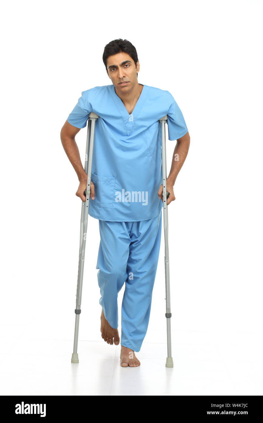 Patient walking with the help of crutches Stock Photo Alamy