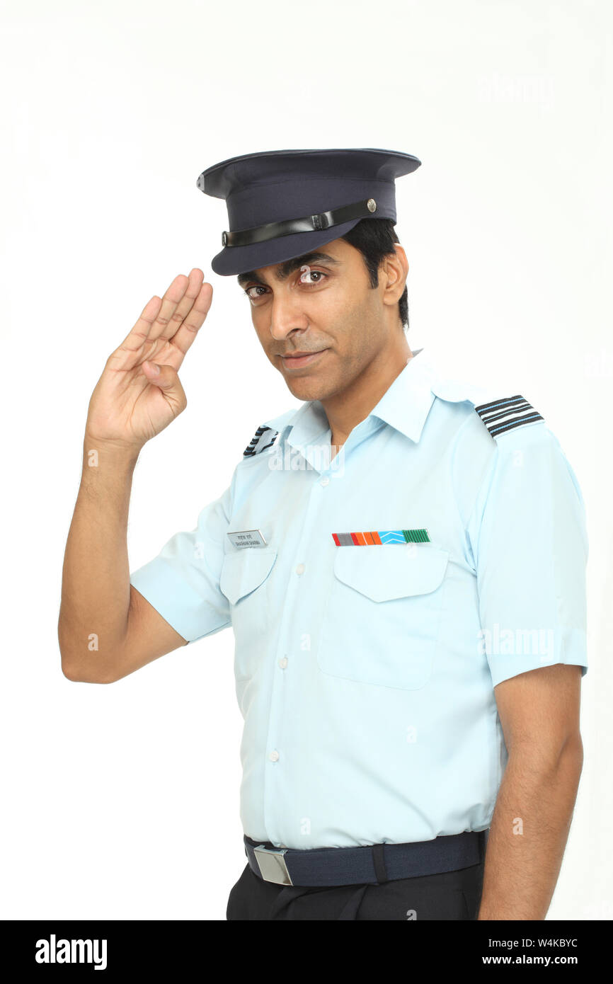 Pilot saluting Stock Photo - Alamy