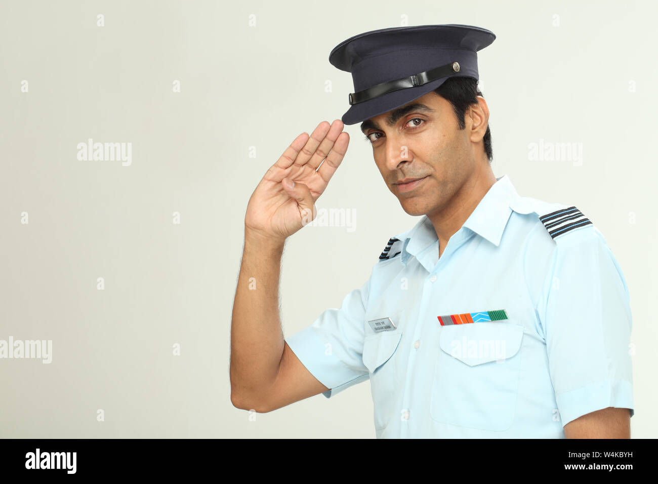 Pilot saluting Stock Photo - Alamy