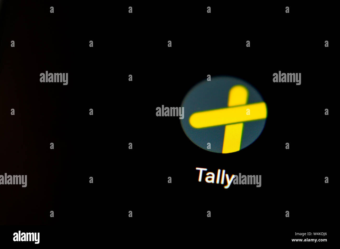 Tally Money banking app on the smartphone screen. Tally is innovative banking platform and the unit of currency that backed by gold. Stock Photo