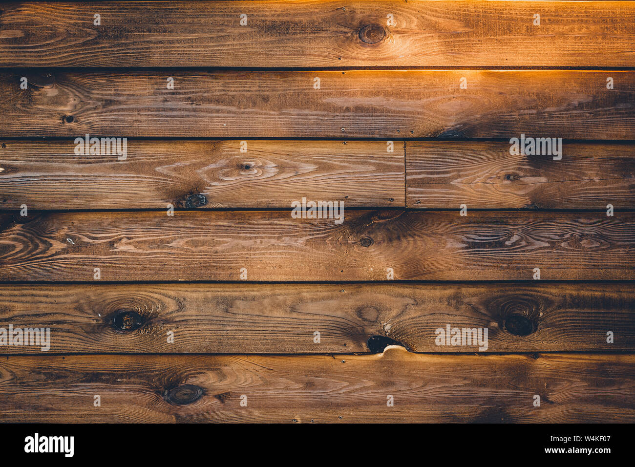 Old wood plank background. Brown wooden texture at horizontal striped. Vintage wall surface, pattern. Dark weathered hardwood, antique board, furnitur Stock Photo
