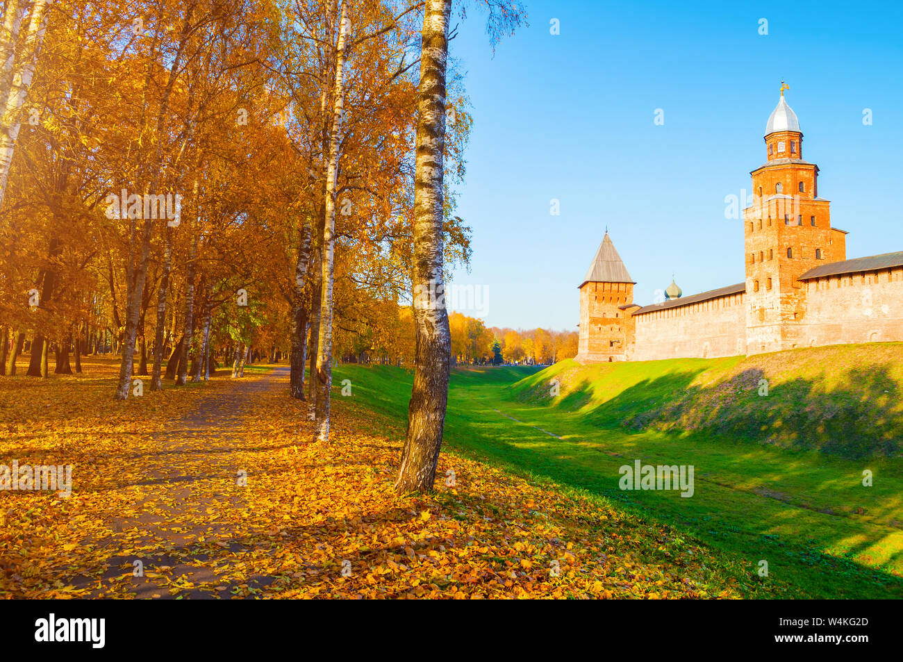 Veliky Novgorod, Russia. Kokui and Prince towers of Veliky Novgorod Kremlin fortress in sunny autumn afternoon. Focus at the fortress, autumn city lan Stock Photo