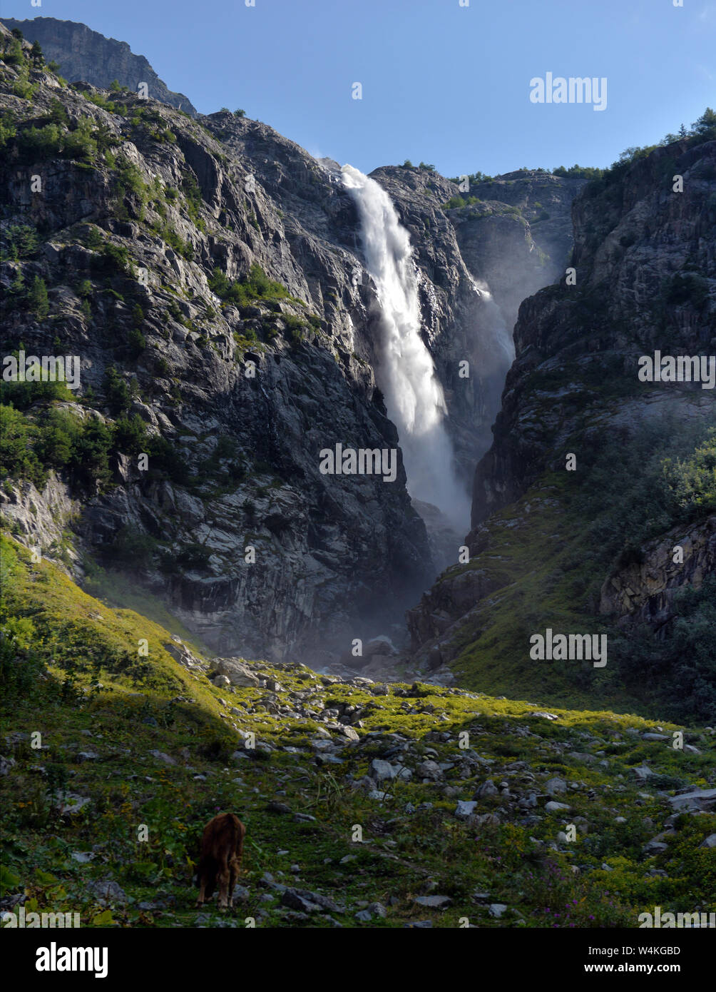 Landscape with a mountain waterfall with a fast stream Stock Photo - Alamy