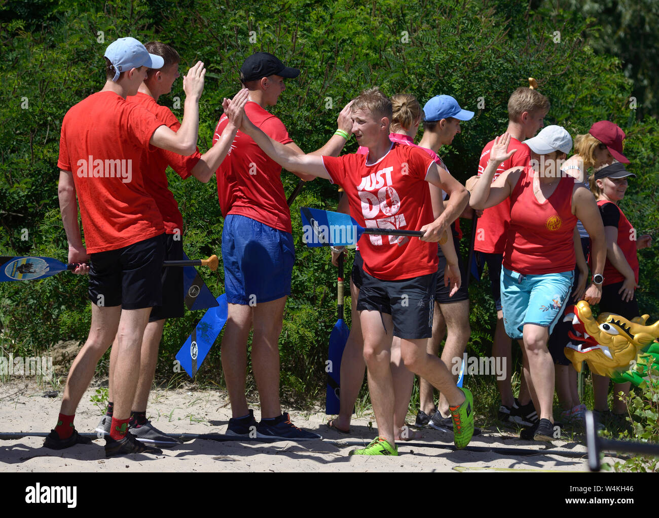 Oarsmen greeting each other. Kiev oblast championship among amateurs. May 25, 2019. Kiev, Ukraine Stock Photo