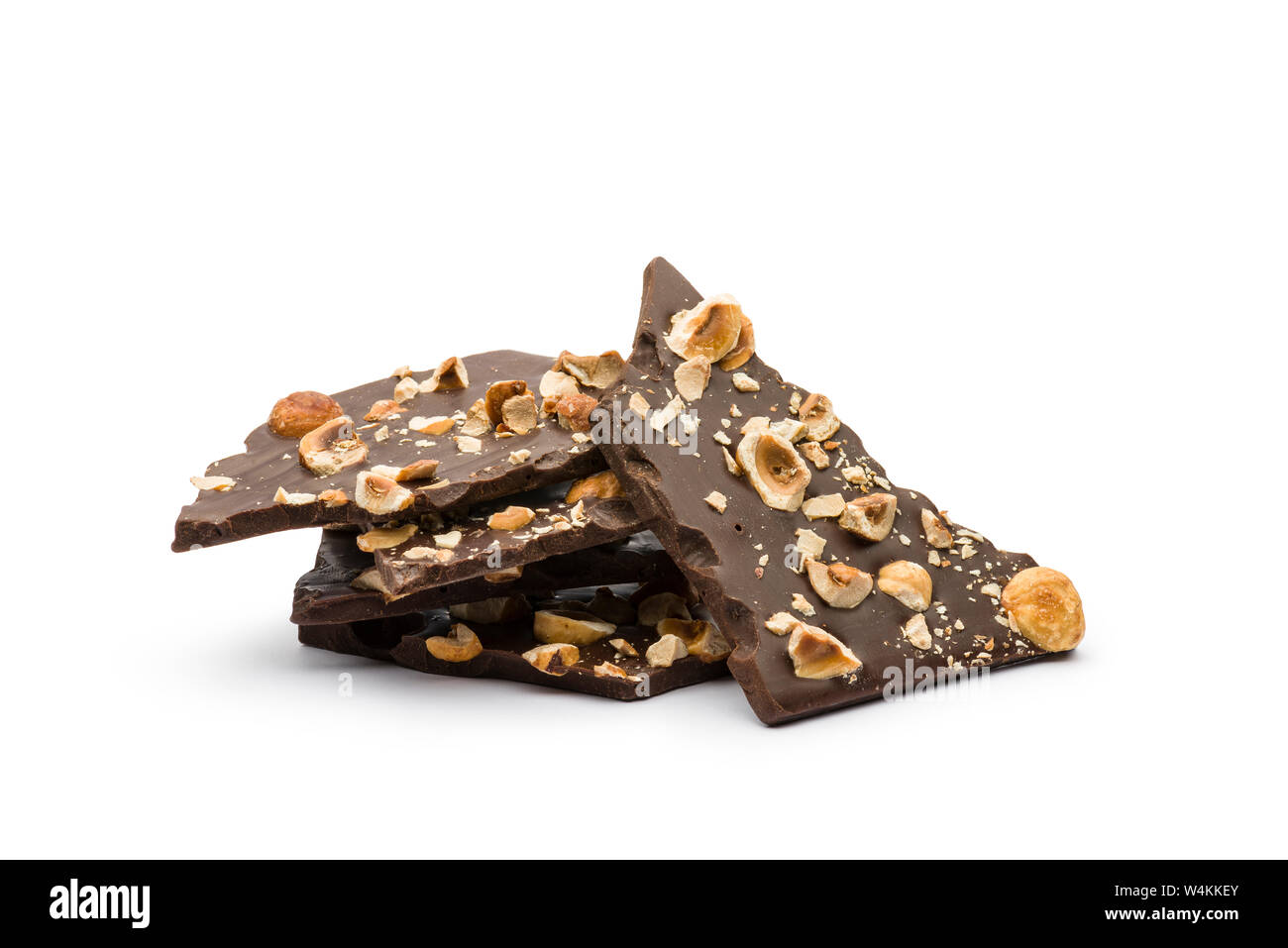 hazelnut dark chocolate chunks on white background Stock Photo