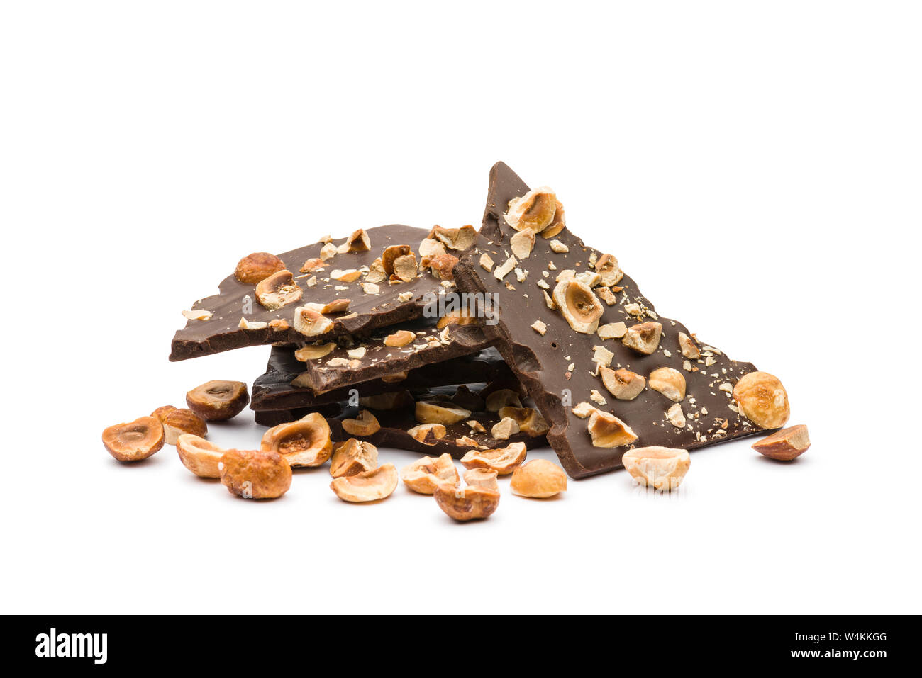 hazelnut dark chocolate chunks on white background Stock Photo