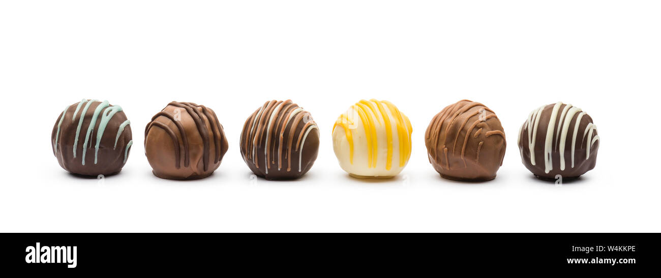 assorted chocolates confectionery on white background Stock Photo
