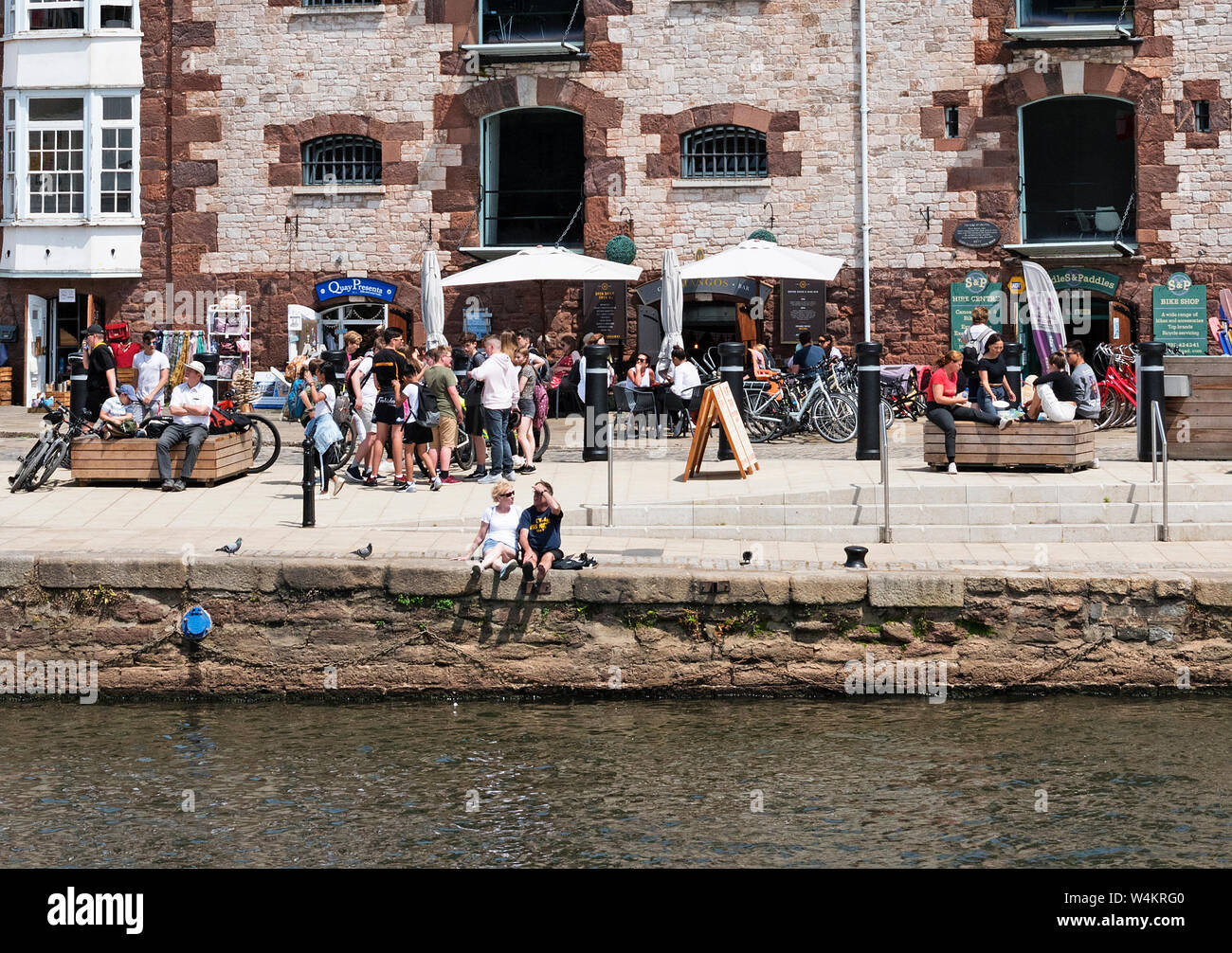 cafes and people at the historic quayside in exeter, devon, england, britain, uk. Stock Photo