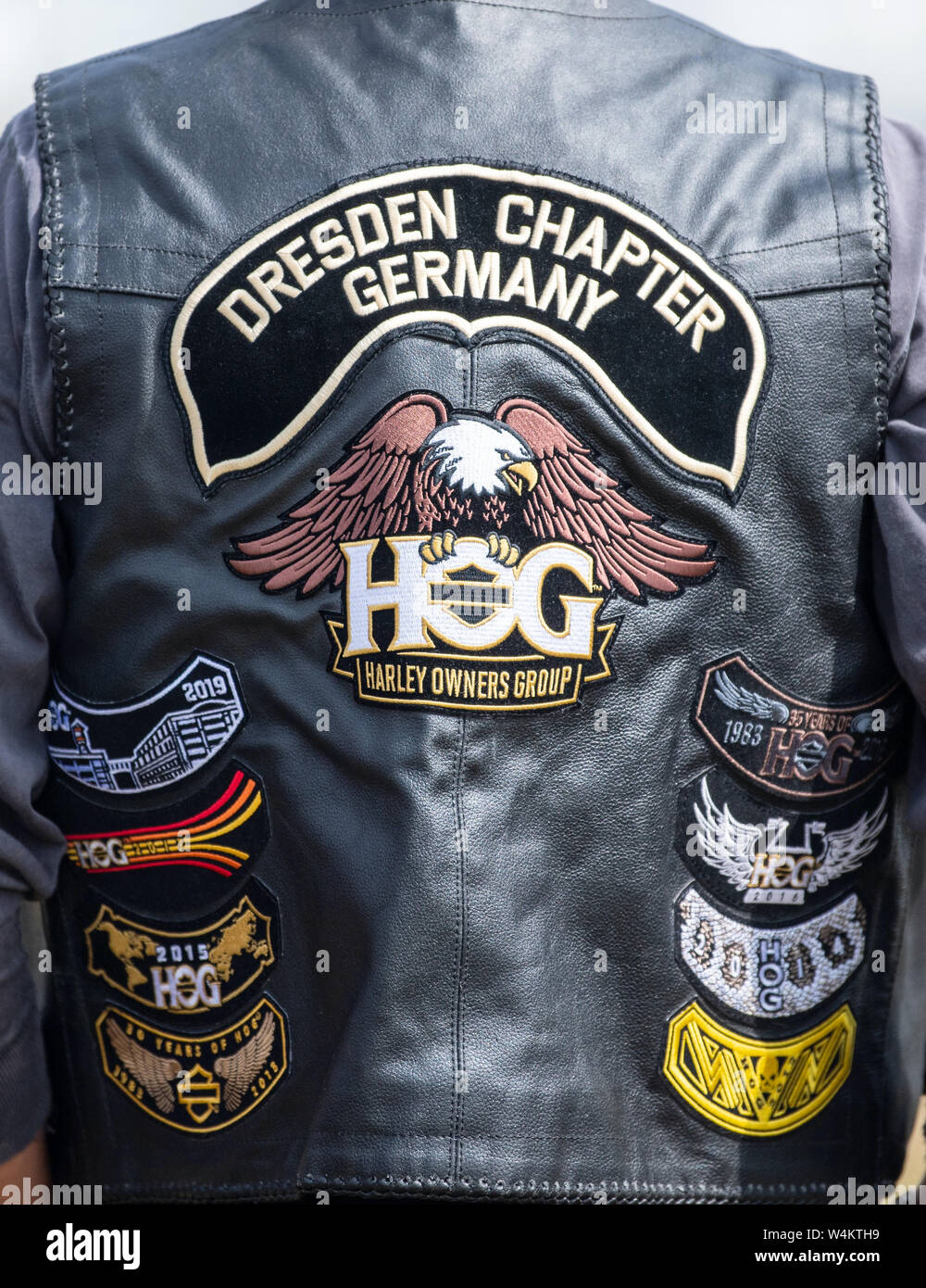 22 July 2019, Saxony, Dresden: A member of the Dresden Harley Davidson Club,  "Dresden Chapter Germany Harley Owners Group" is at a press and photo shoot  for the Harley Days Dresden 2019