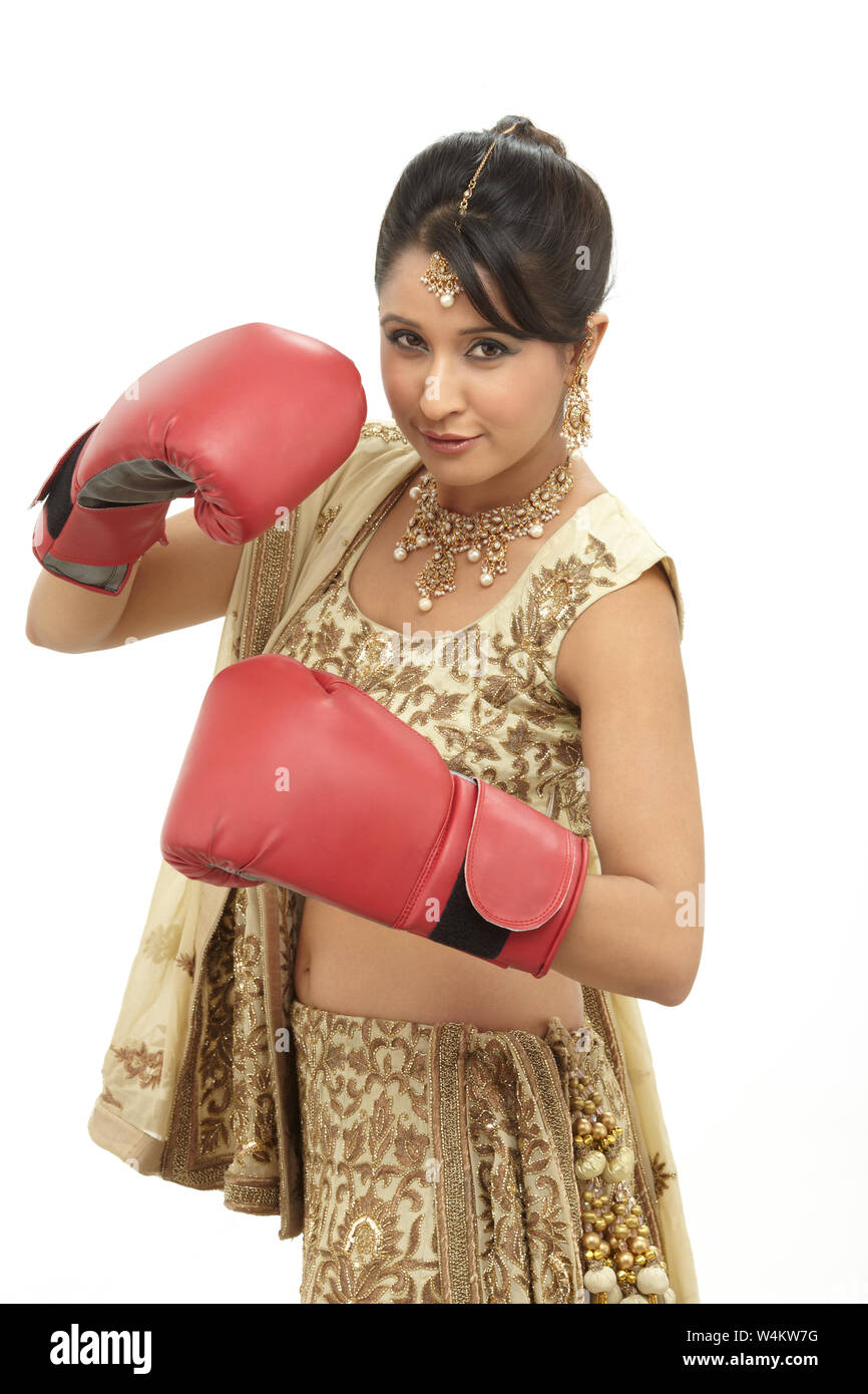Indian bride wearing boxing gloves Stock Photo Alamy