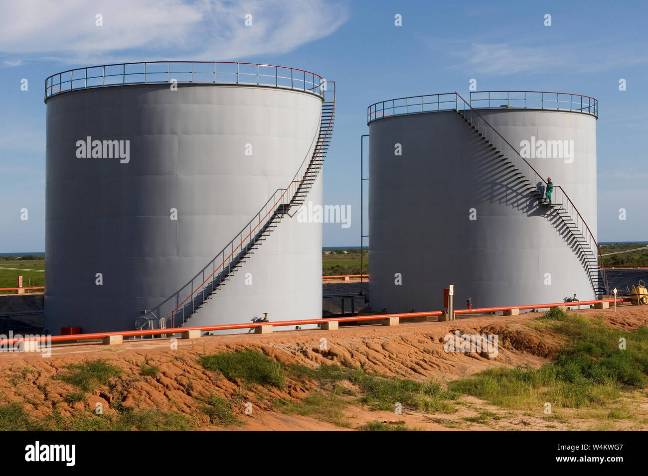 Mining, managing & transporting of titanium mineral sands. Oil storage tanks providing fuel for mine, site, port facilities and shipping. Stock Photo