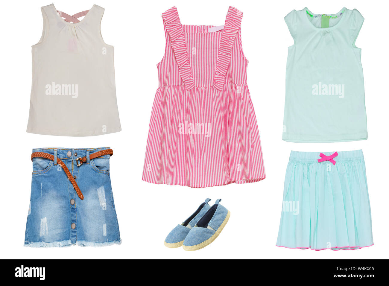 Collage set of little girl summer clothes isolated on a white background. The collection of jeans skirt and shoes, short summer skirt, two shirts and Stock Photo