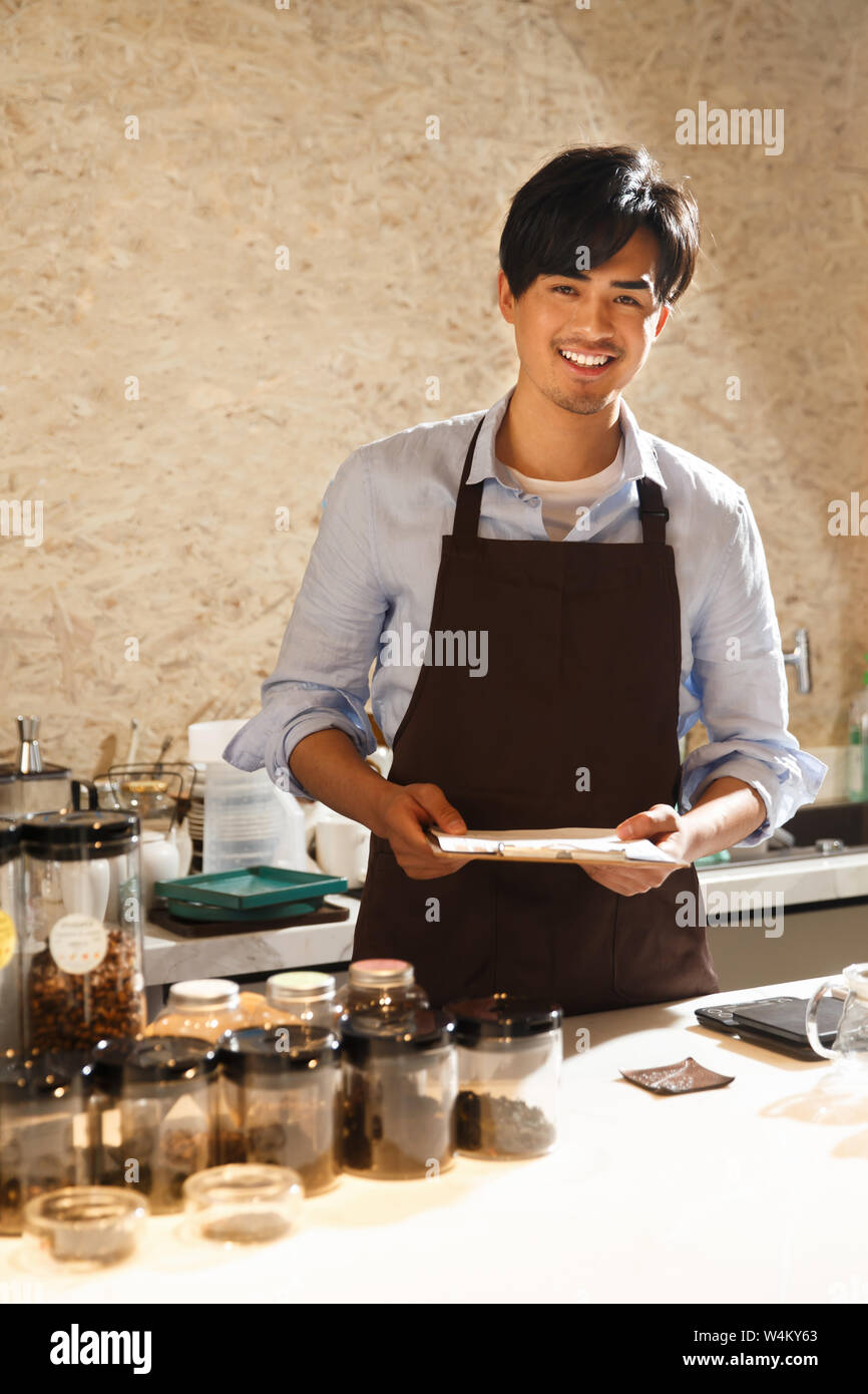 Coffee shop attendant Stock Photo