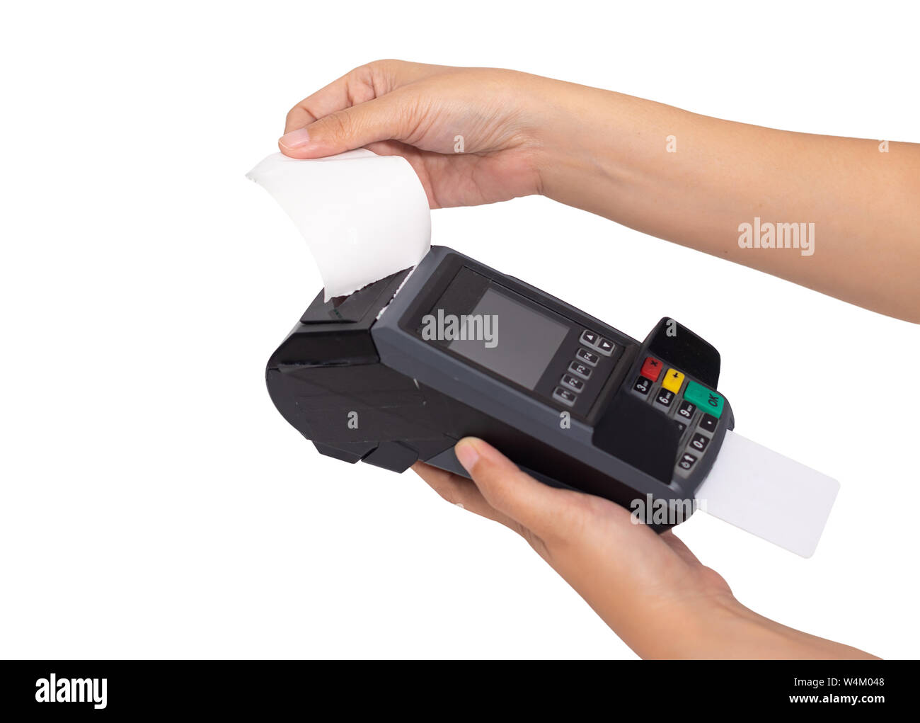 close up of merchant hand split receipt paper from credit card swipe machine at point of sale terminal, clipping path include Stock Photo