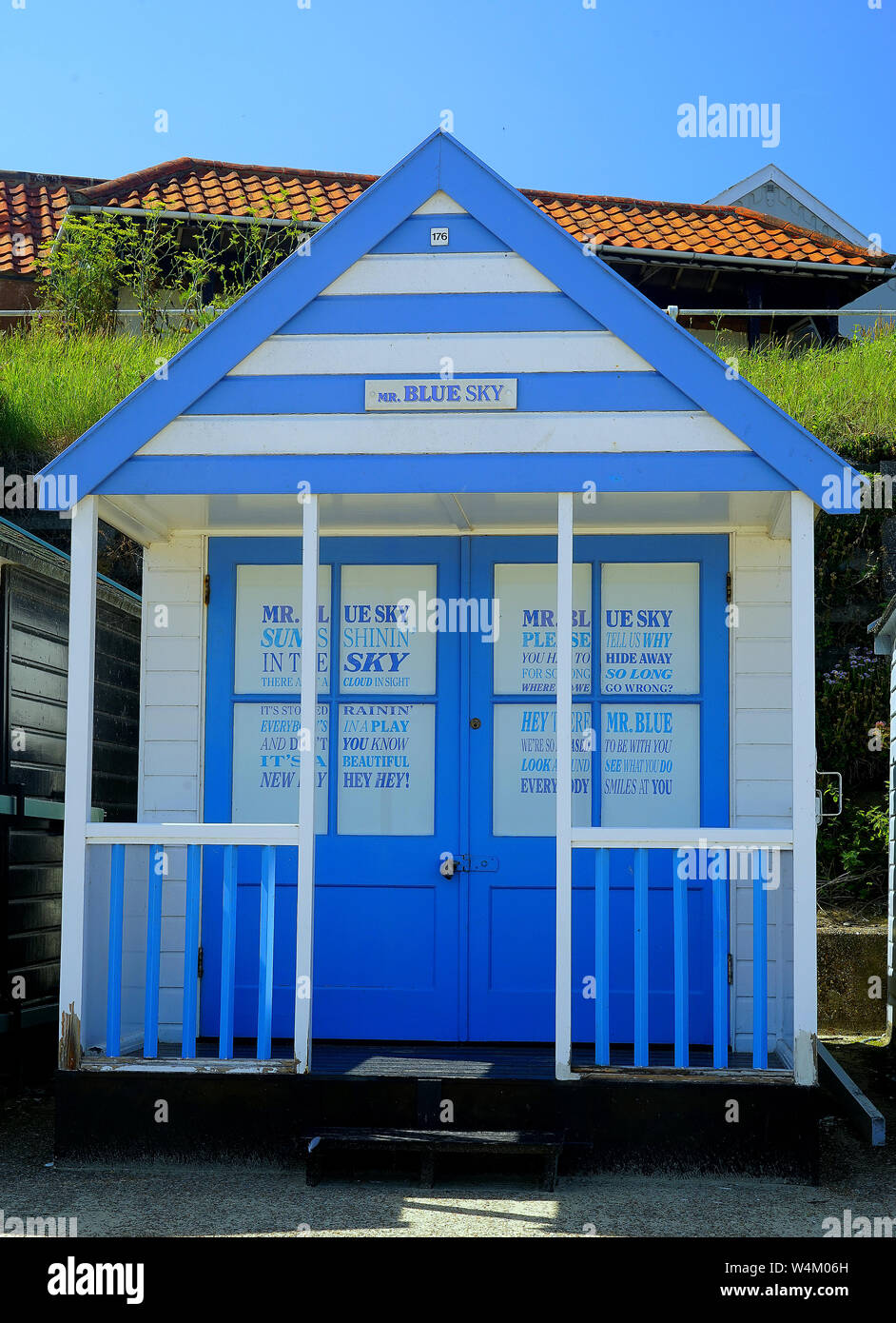Mr Blue Sky Beach Hut Stock Photo