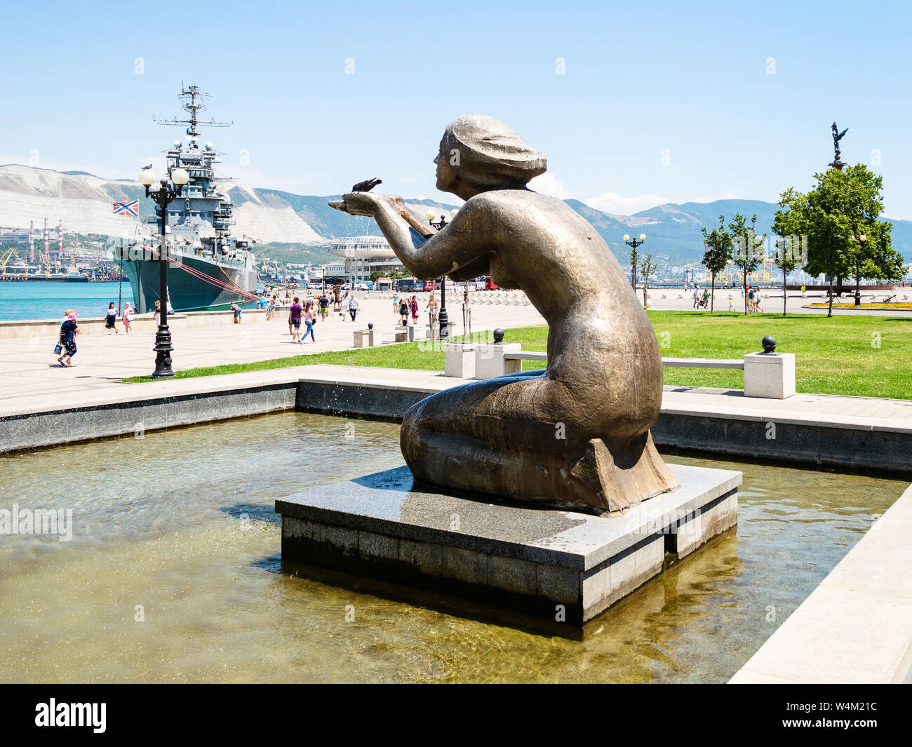 NOVOROSSIYSK, RUSSIA - JULY 7, 2019: tourists walk to sea port near ...