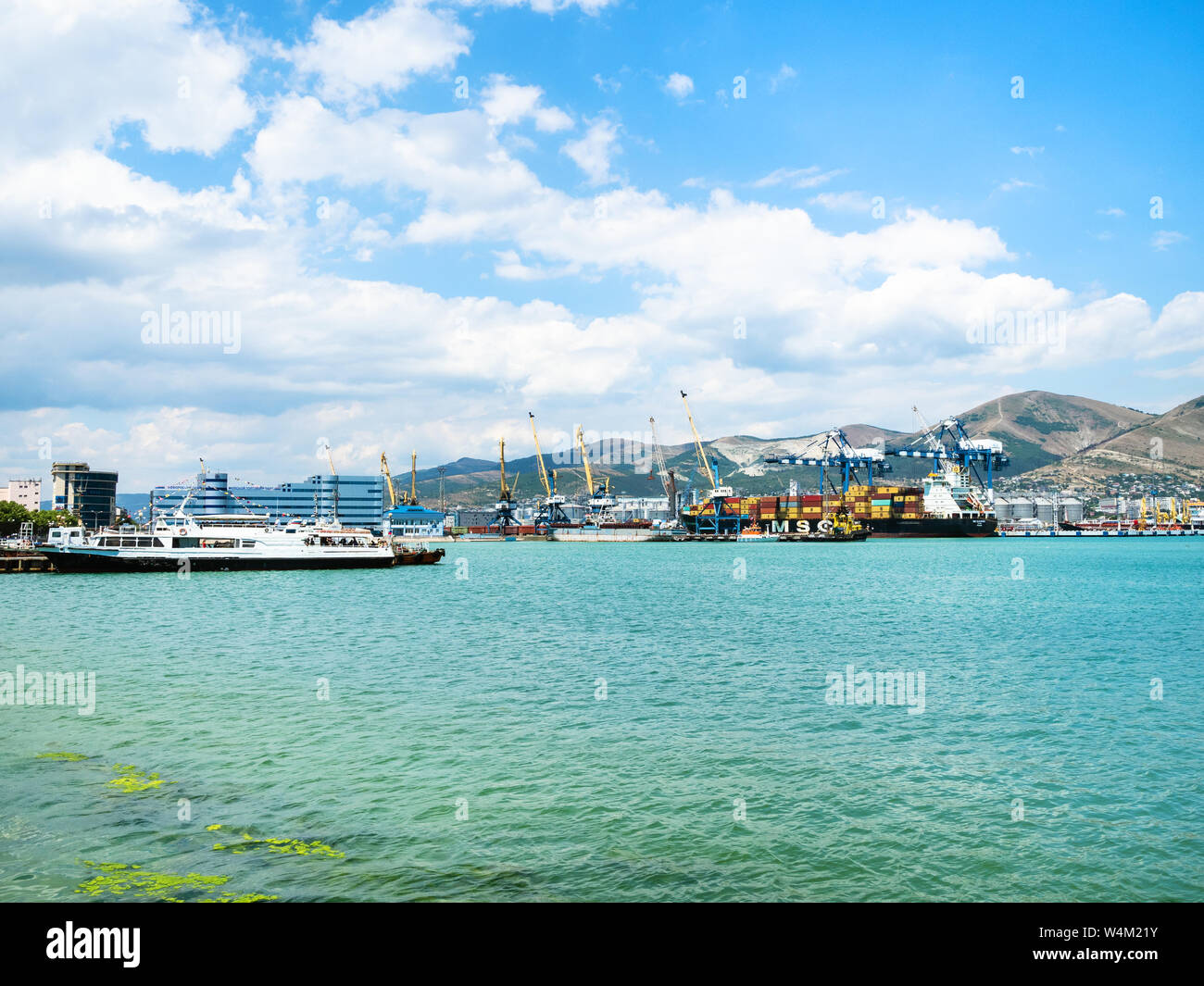 NOVOROSSIYSK, RUSSIA - JULY 7, 2019: ships in sea port in Novorossiysk. Novorossiysk is city in Krasnodar Krai, Russia, it is main country's port on B Stock Photo