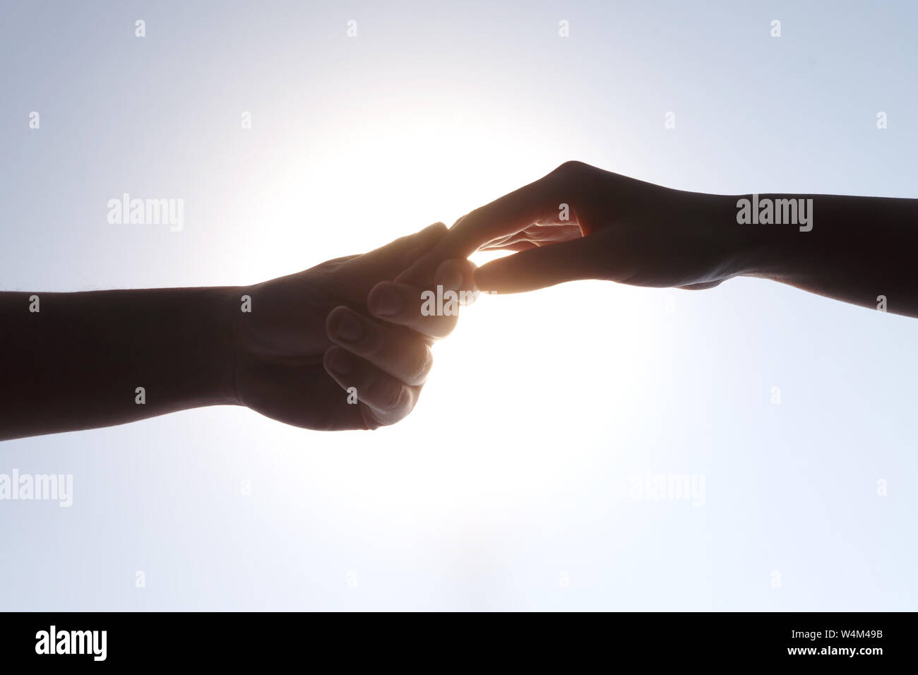 Hand in hand Stock Photo - Alamy