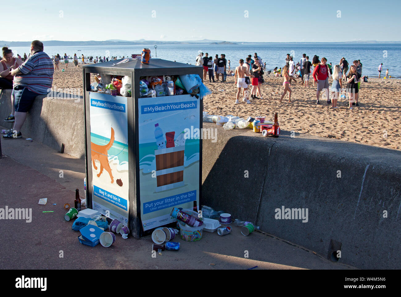 Portobello Beach, evening, overflowing rubbish bins, Edinburgh, Scotland, UK Stock Photo