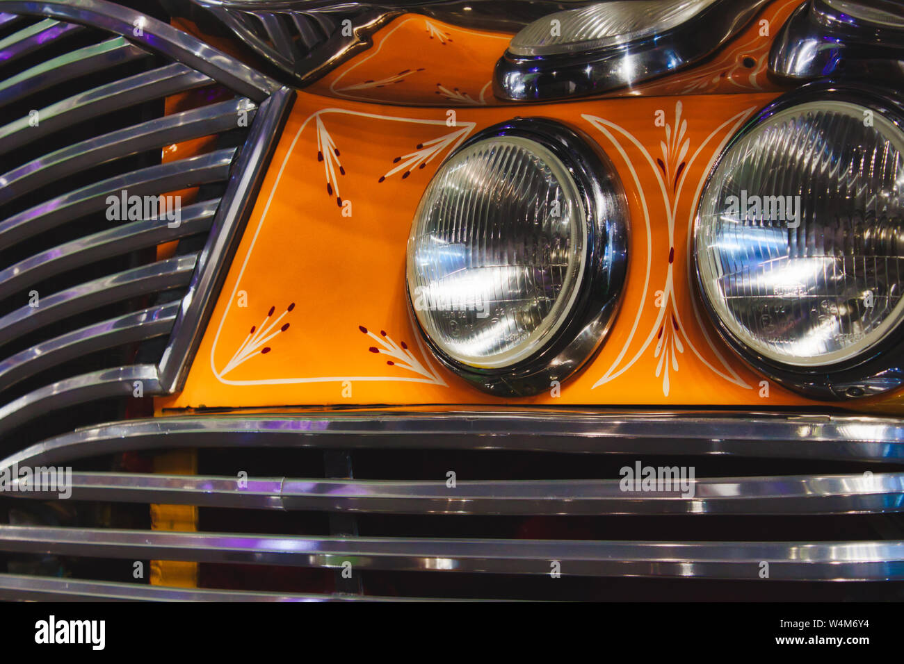 Close-up details of a vintage Maltese bus with headlamps and grill Stock Photo