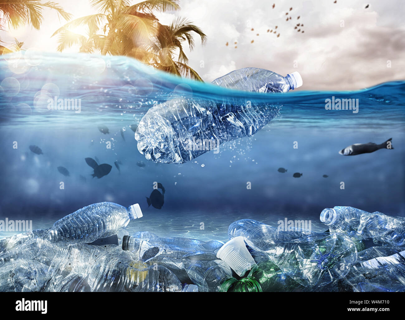 Floating bottle. Problem of plastic pollution under the sea concept Stock Photo