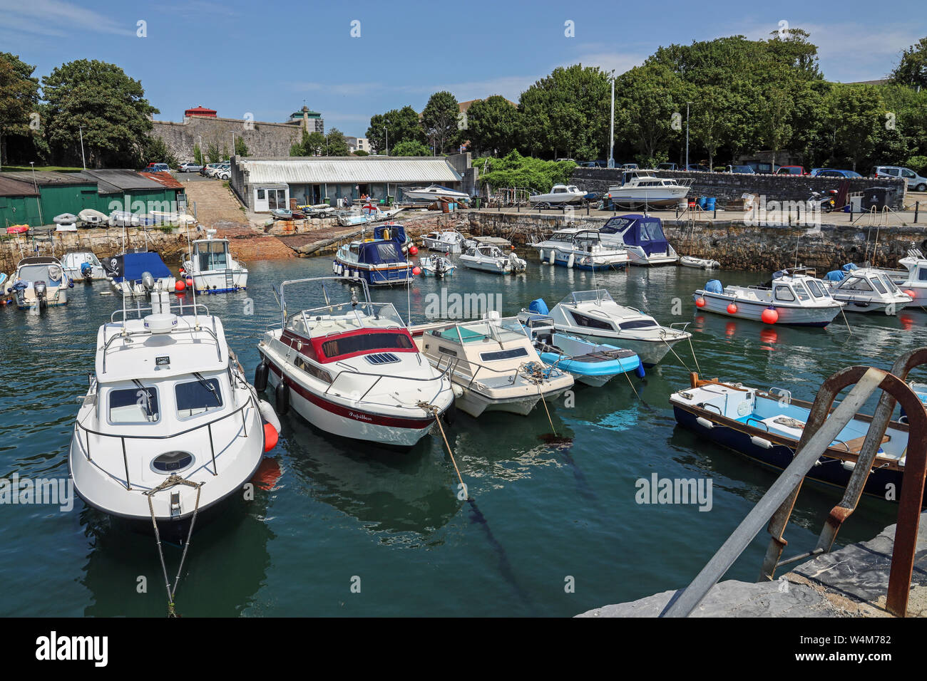 Boats berthed in safety at the quay at Mutton Cove in Devonport Stock