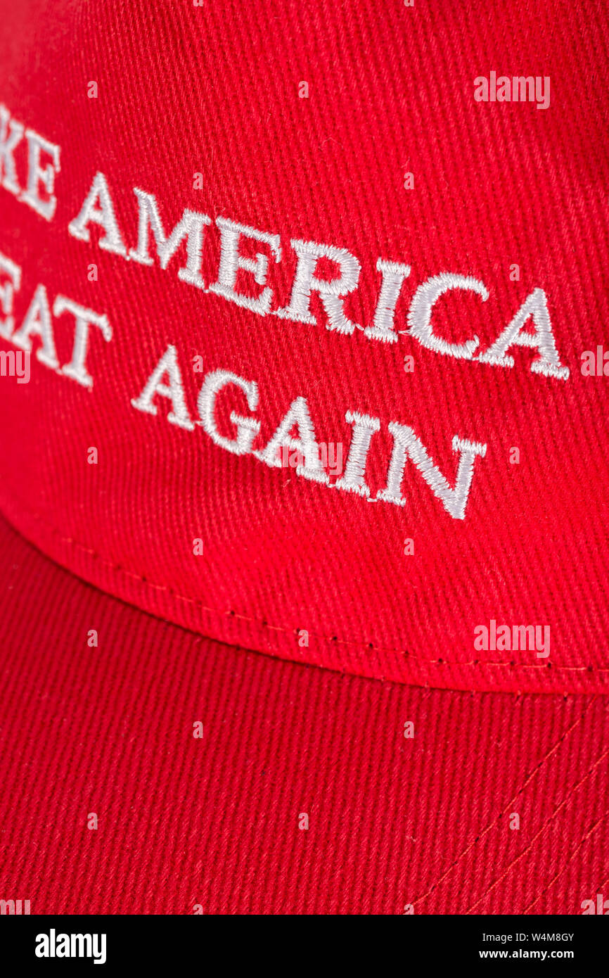 Macro close-up Red Trump MAGA cap focussing on 'Make'. Metaphor Maga hats, Trump supporters, Trump presidency 2024 U.S. elections, Trump America first Stock Photo