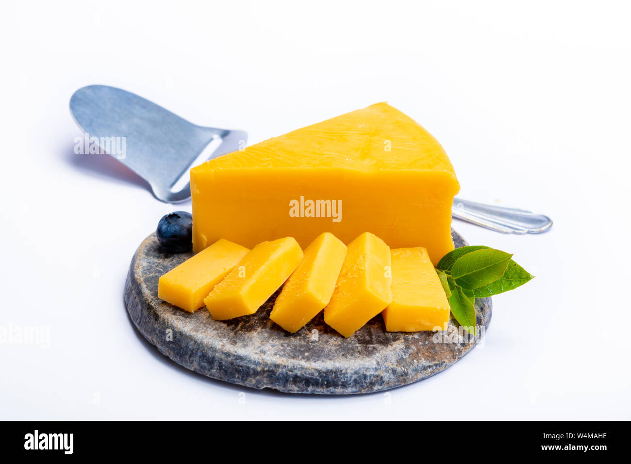 Cheddar cheese collection, piece of yellow Cheddar cheese made from cow