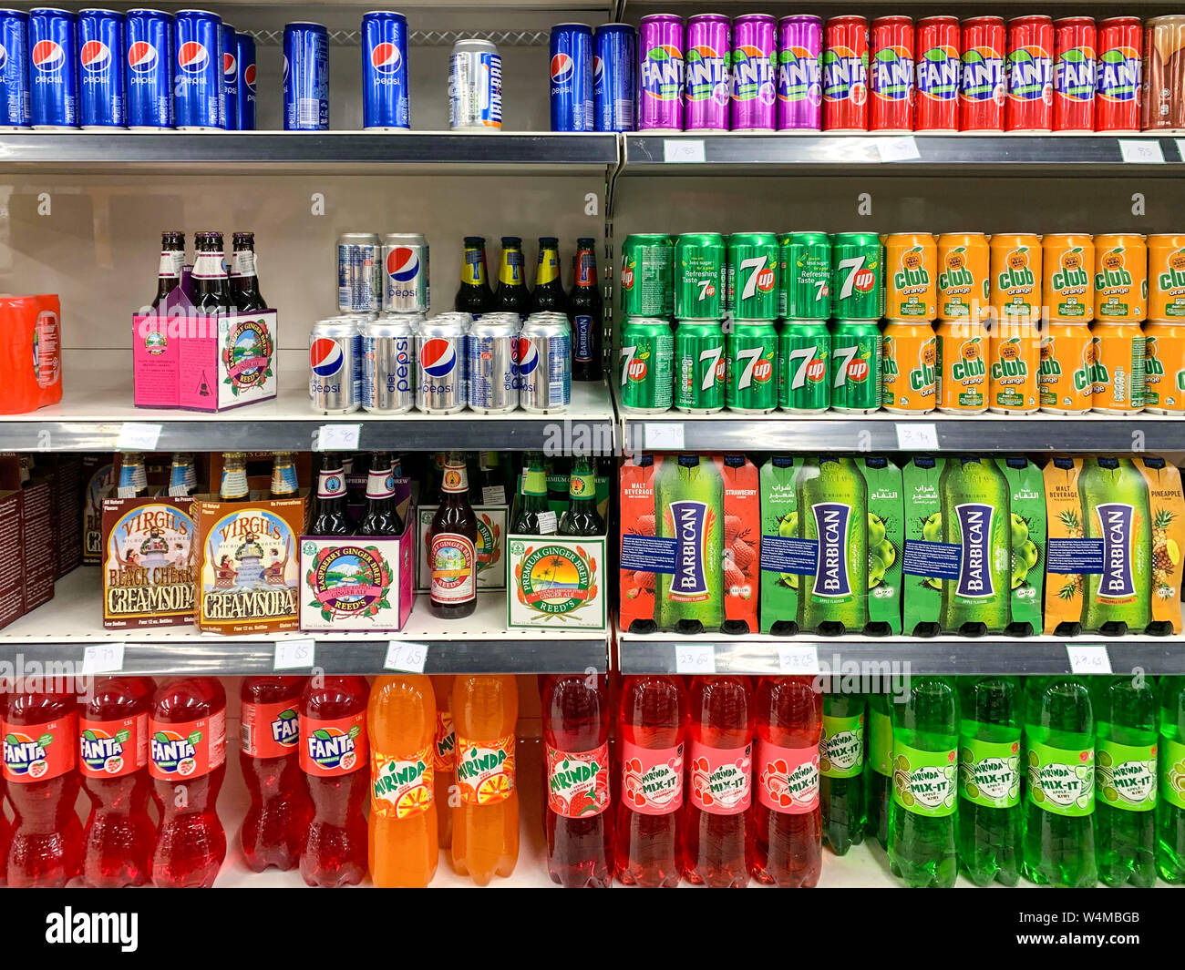 Kuala Lumpur, Malaysia - July 21, 2019: Various type of bottled drinks and juices on display at the shelves of Cold Storage supermarket. Illustrative Stock Photo