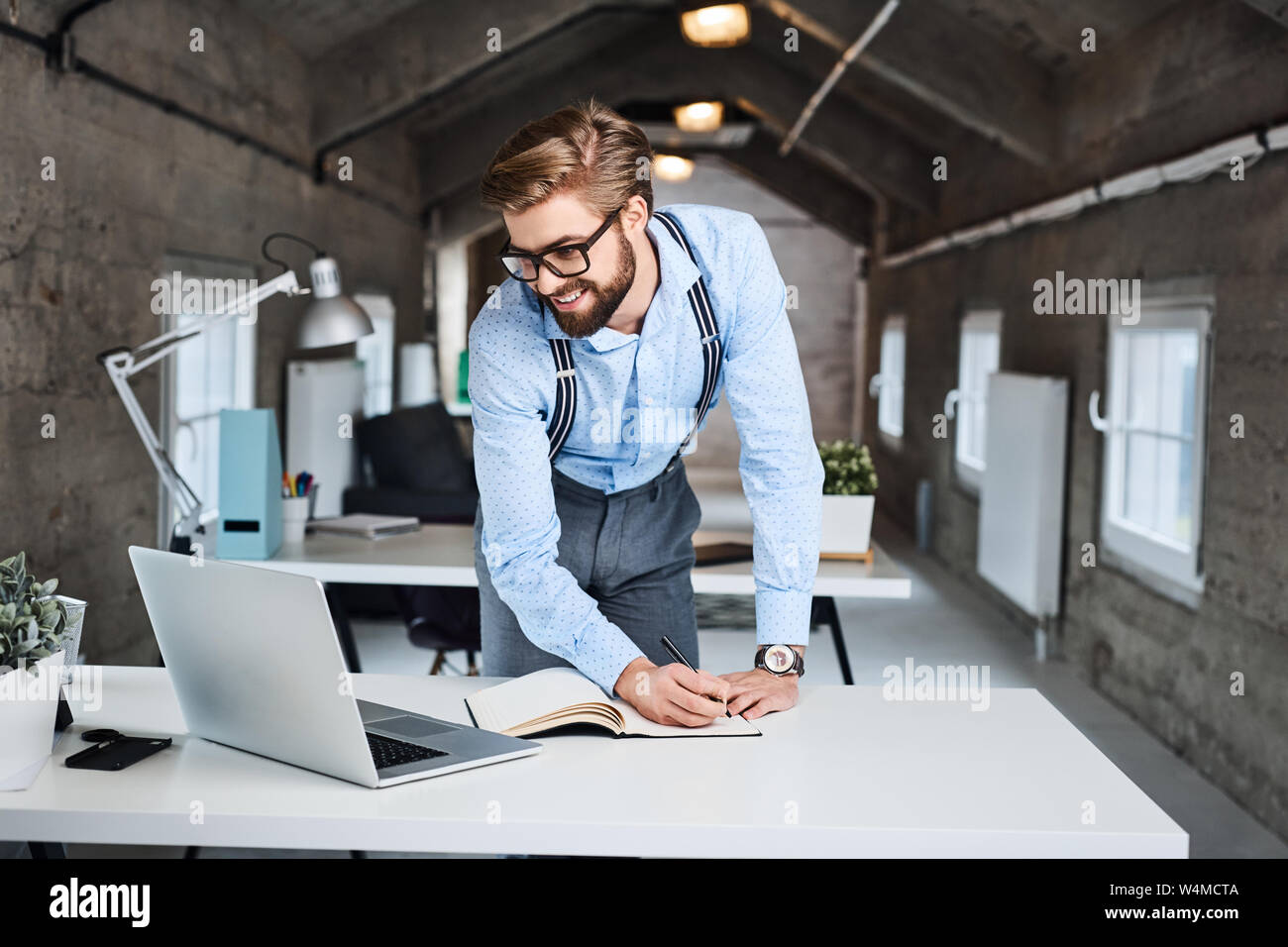 Hipster, businessman working at modern office Stock Photo