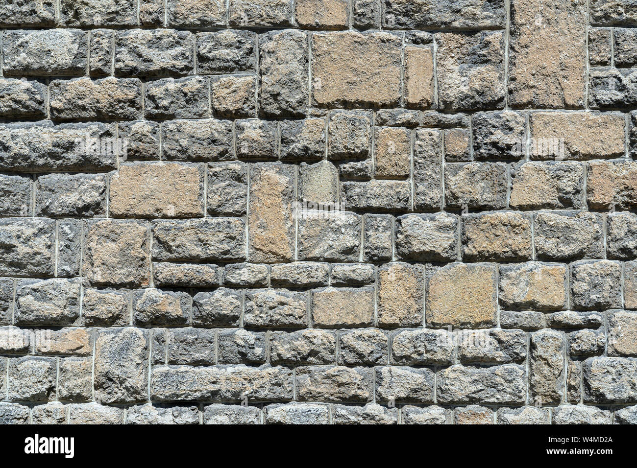 Old gray brown stone wall Stock Photo