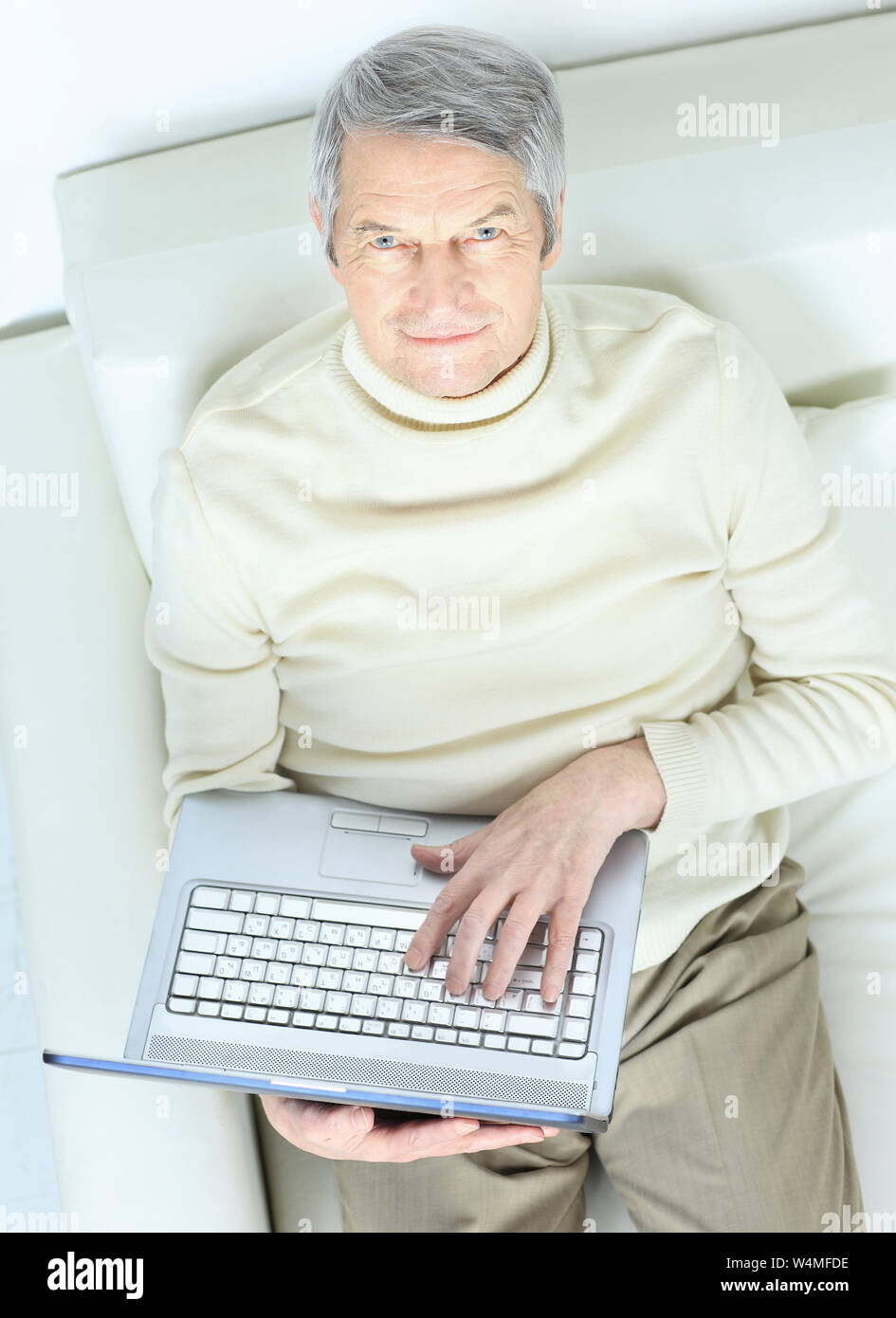 Happy older sofa cosy hi-res stock photography and images - Alamy