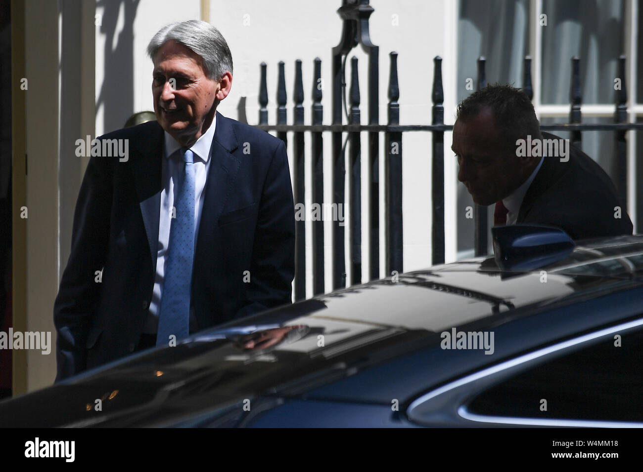 (190724) -- LONDON, July 24, 2019 (Xinhua) -- British Chancellor of the Exchequer Philip Hammond leaves 11 Downing Street in London, Britain on July 24, 2019. (Photo by Alberto Pezzali/Xinhua) Stock Photo