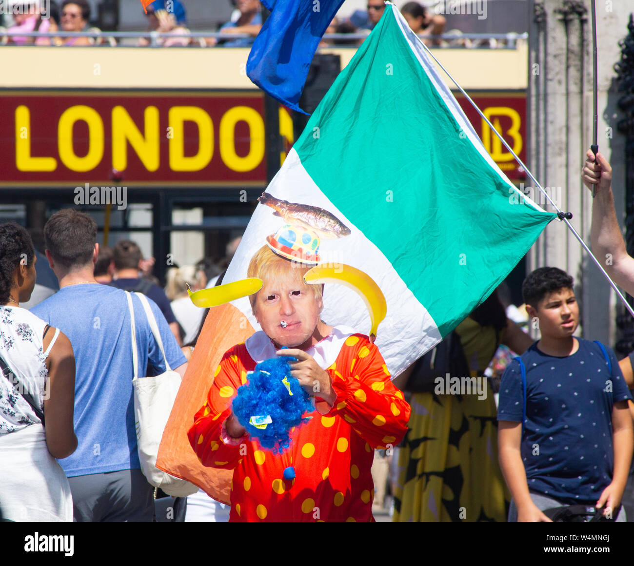Westminster, London, UK July 24th. Anti Brexit and Pro Leave campaigners and those against  Boris Johnson, the new Prime Minister, express their views ahead of the resignation of Prime Minister Theresa May, and the appointment of her successor the Rt Hon Boris Johnson (Prime Minister in waiting). PICTURED: 'The Clown' a regular performer outside of the Houses of Parliament. Credit: Bridget Catterall/Alamy Live News Stock Photo