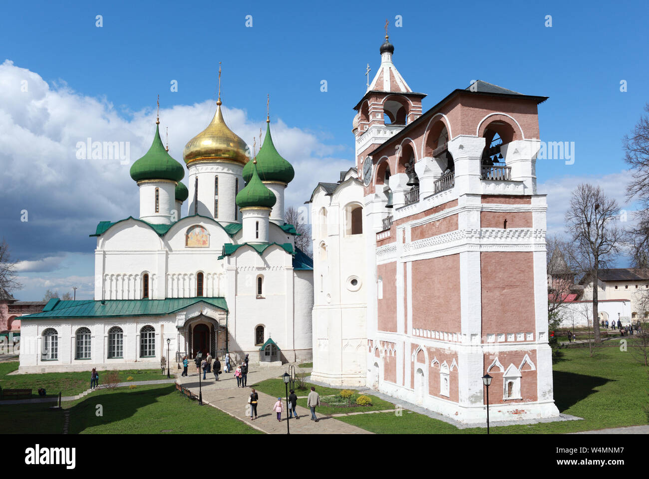 People at Transfiguration Cathedral with its Belfry in the Saviour Monastery of Saint Euthymius in Suzdal, Russia. Stock Photo